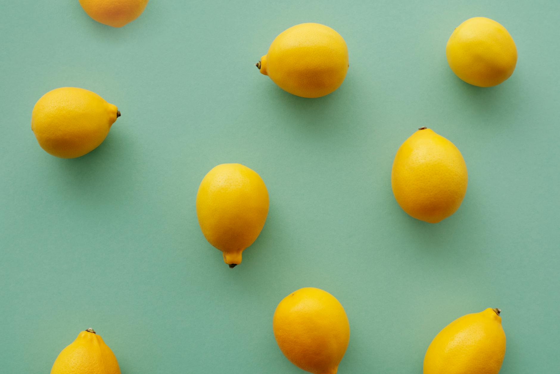 Yellow silicone vibrator on a bright background, representing the lemon clitoral toy experience